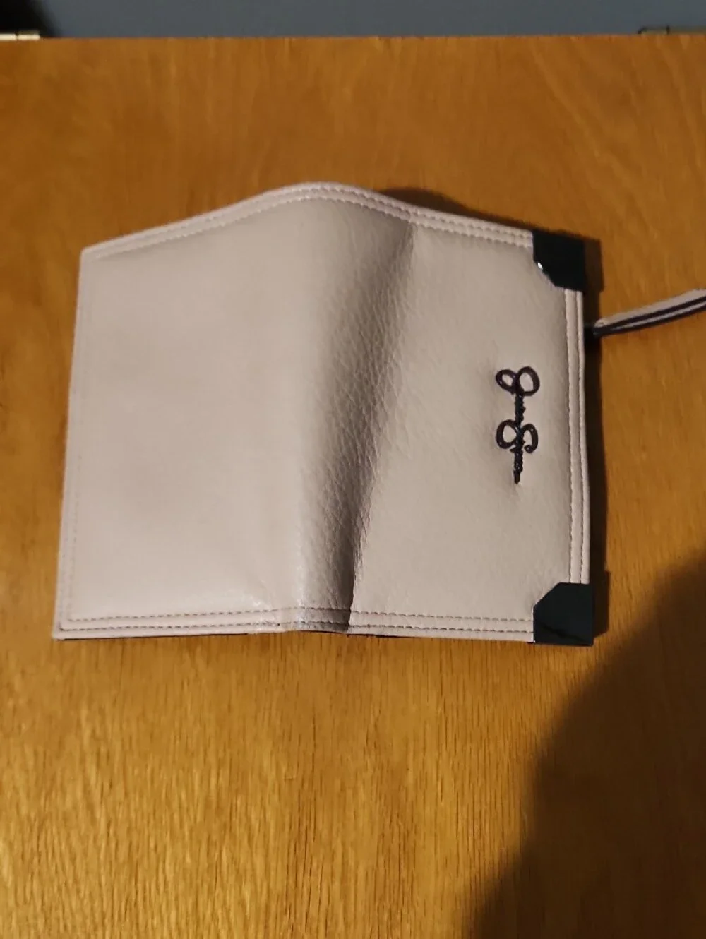 Jessica Simpson Pale Pink Leather Zip-Around Wallet with Black Accents